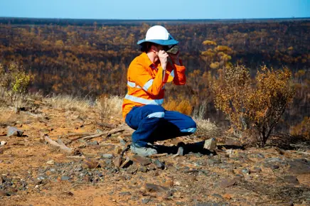 Geologist looking at samples Geologist looking at samples